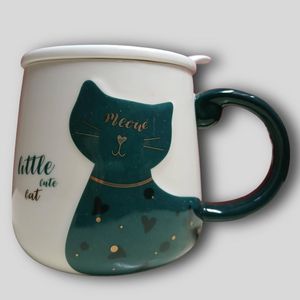 Ceramic mug with spoon and lid