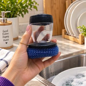  Dish-washing scrubber with built-in soap dispenser – cleaning sponge for dishes and kitchenware with an ergonomic handle.