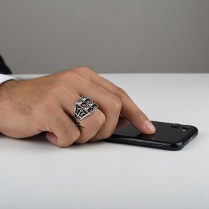 men's handmade Ottoman-style 925 sterling silver ring with red simulated zircon stones.