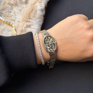 Infinity ساعة "تايجر أوفال" بسوار مرن – ستانلس ستيل (تصميم عصري ونقشة مميزة).