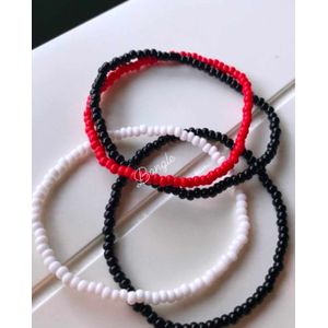 حظاظات استيك مطاط 4 اساور لون اسود وابيض واحمر