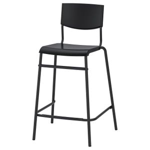 Bar stool with backrest A black STIG bar stool with a metal frame and plastic seat/back, suitable for counter or kitchen island use.