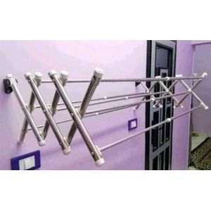 Folding wall-mounted clothes rack and a multi-use drying washing rack made of stainless steel. It is mounted on the wall. It is made of multi-purpose steel and its size can be adjusted whether in width or length. It is very durable