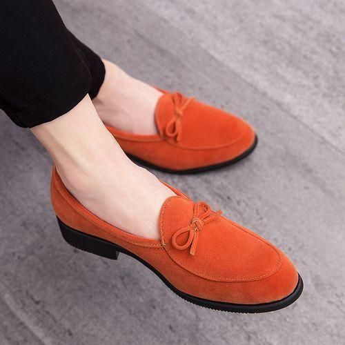 Big orange shoe shop top