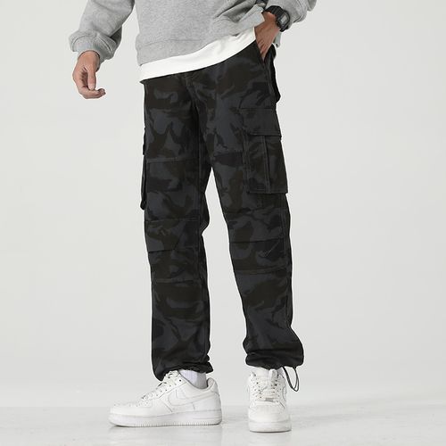 ASOS DESIGN tapered cargo trousers in black with toggles | ASOS