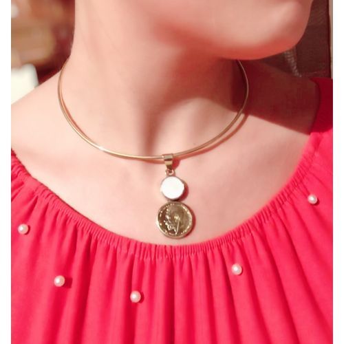 Coin shaped pendant on a necklace hotsell