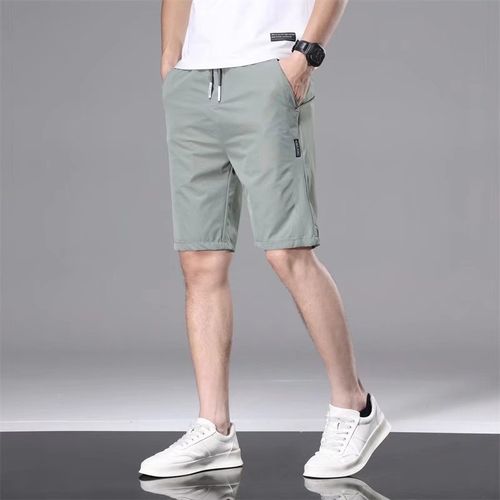 Buy Celio Men Khaki Solid Trousers Cum Shorts  Trousers for Men 1812301   Myntra