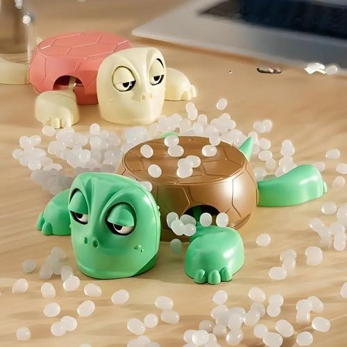 product_image_name-Generic-هذه قاعدة الأكواب على شكل سلحفاة تتميز بتصميم مضحك بعيون مفتوحة وأطراف قابلة للعصر. تصدر صوت طفيف عندما يوضع كوب عليها-4