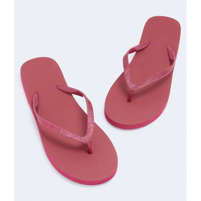 red sparkly flip flops