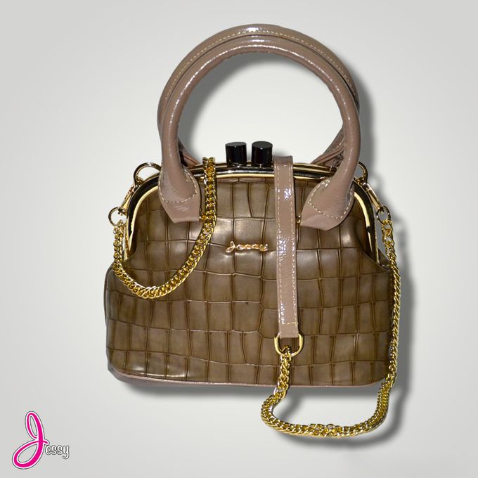 Jessy Shenoute Leather Bag Golden Chain Circular Hand Golden Frame