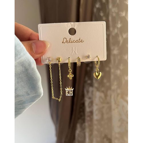 set of three pairs of gold-toned stainless steel stud earrings