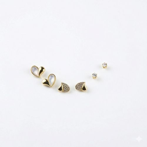 set of three pairs of gold-toned stainless steel stud earrings