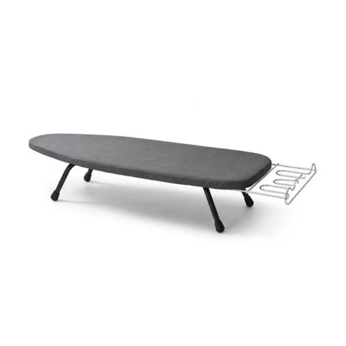 Compact, portable tabletop ironing board for offices and small spaces.