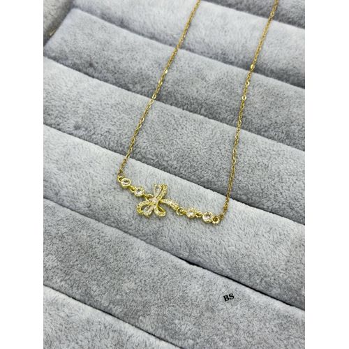 Elegant Ribbon Knot Pendant Necklace in Gold-Tone Stainless Steel